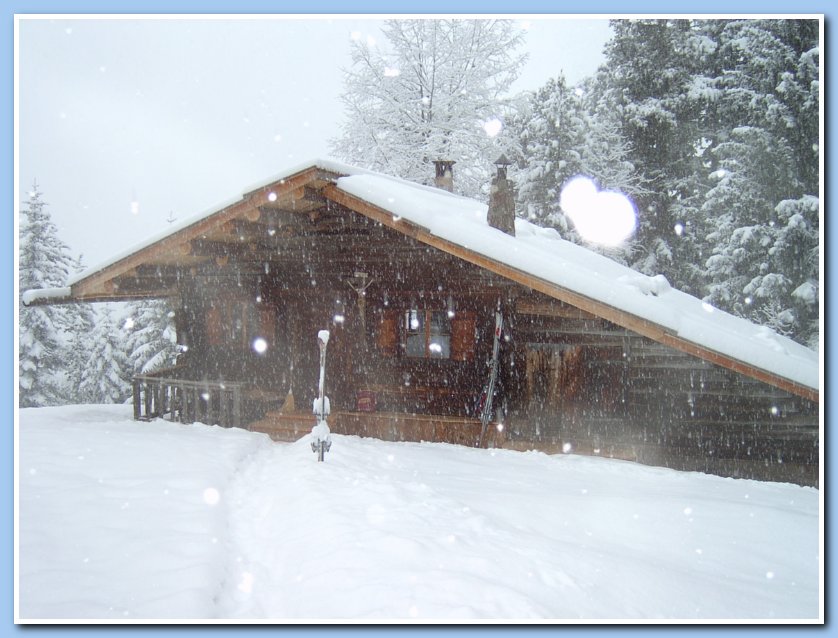 cabin with snow